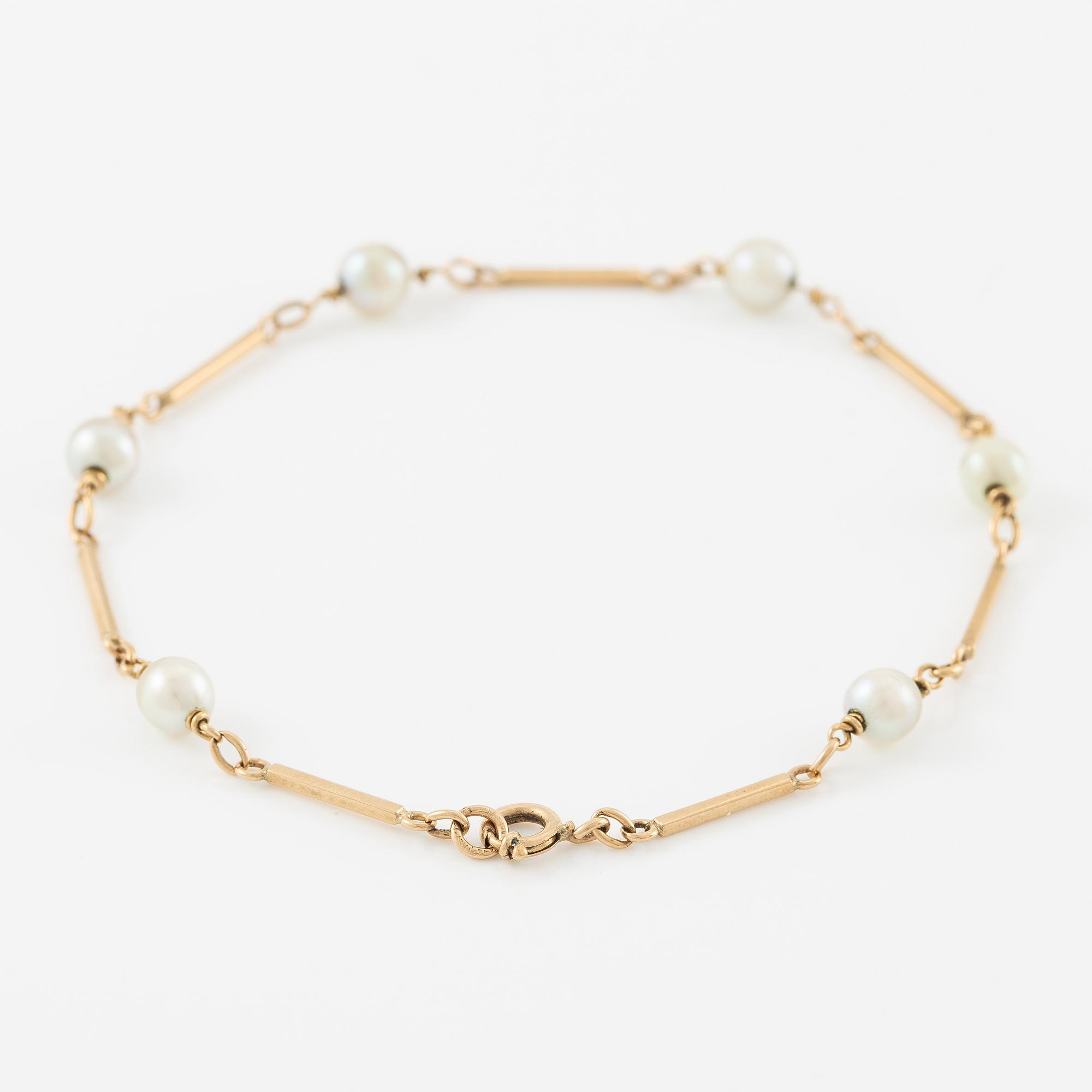 Armband, 18K guld med pärlor.