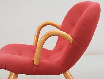 A 1940's-50's 'Clam chair' attributed to Philip Arctander.