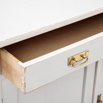A conrtemporary painted cupboard.