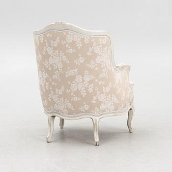 Armchair, bergère model, Rococo style, circa 1900.