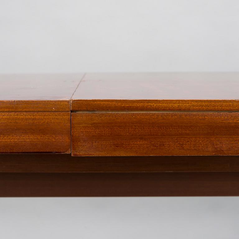 A mid 20th century conference table / dinner table marked Paul Boman.