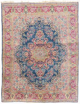 A carpet, Kerman, ca 358 x 275 cm.