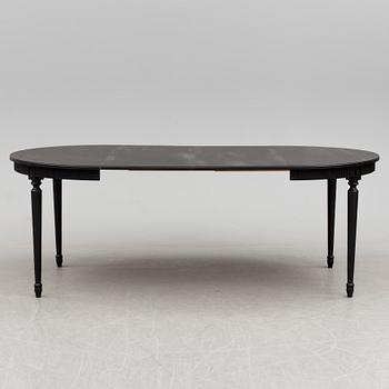 A second half of the 20th century Gustavian style dining table.