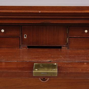 A late Gustavian mahogany writing commode in the manner of I. Löfgren, Stockholm circa 1800.