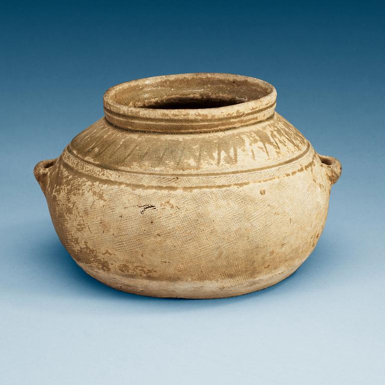 A olive green glazed jar, Western Jin Dynasty, ca 300 AD.