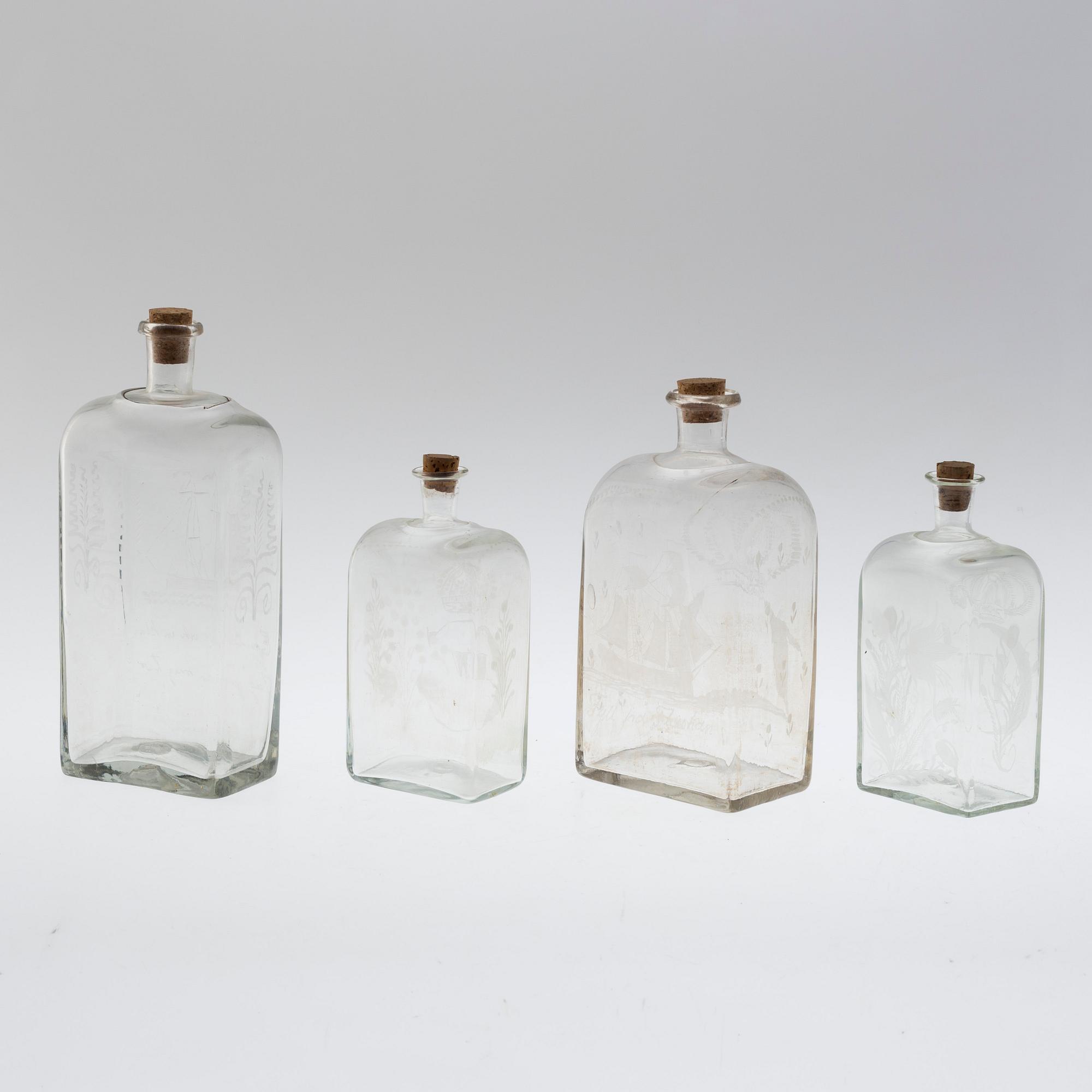 Four brandy bottles, 19/20th century.