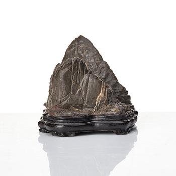 A Japanese rock sculpture, 20th Century. Signed at the base.