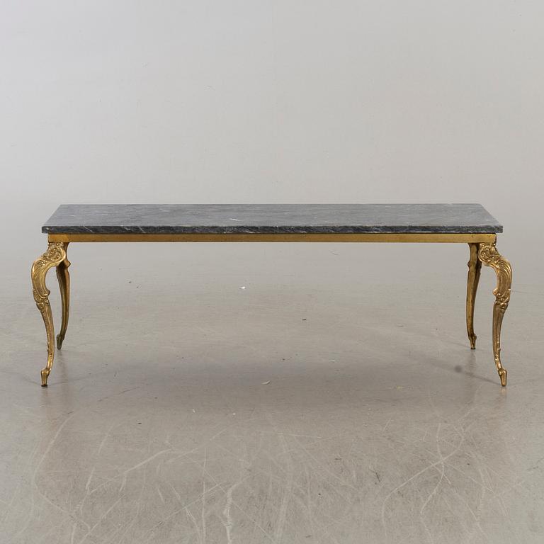 A MARBLE TOP COFFEE TABLE.