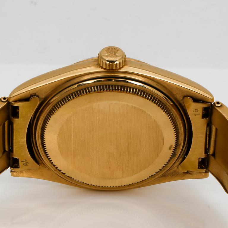 HERRARMBANDSUR, 18 K guld, Rolex Oyster Perpetual Datejust, 1964. Total vikt ca 112 gram.