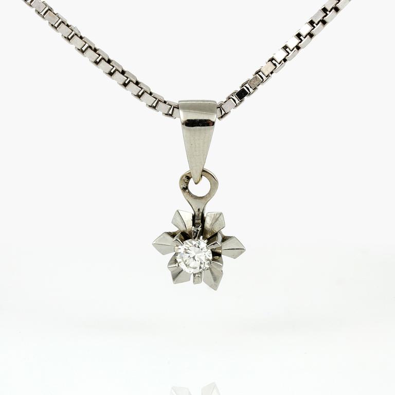 RING samt HALSBAND, ringen 23K guld, Umeå. Vikt 5,17 g. Halsband 18K vitguld med diamant, tot ca 0,09 ct. Vikt 5,47 g.