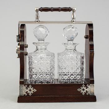 A BOTTLE HOLDER FOR TWO BOTTLES. 20th CENTURY.