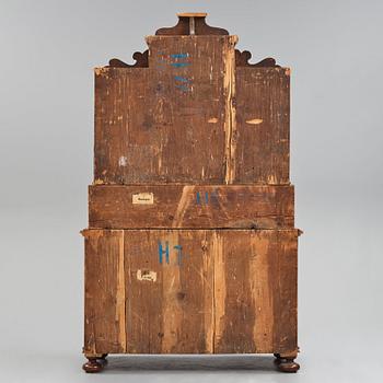 A South German late Baroque walnut and burr-walnut writing cabinet, first part of the 18th century.