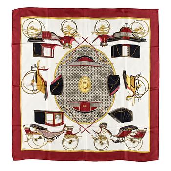 1287. A silk scarf by Hermès, "Les Voitures a Transformation".