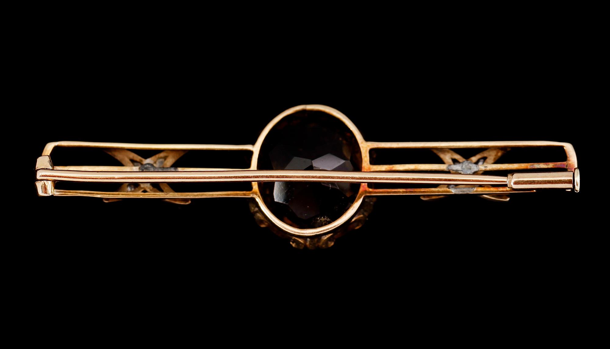 BROSCH, guld och silver, med små rosenstenar, omkring år 1900.
