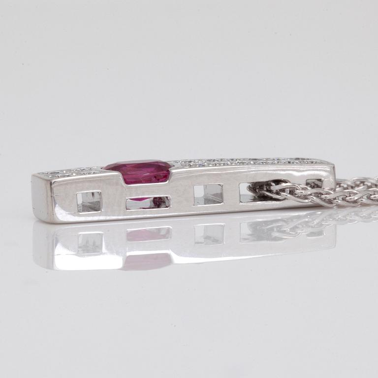 A 1.08ct ruby and brilliant-cut diamond necklace/pendant. Total carat weight of diamonds 0.45ct.