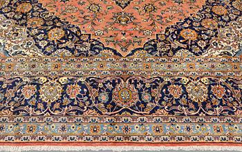 A Keshan older carpet, 430 x 305 cm.