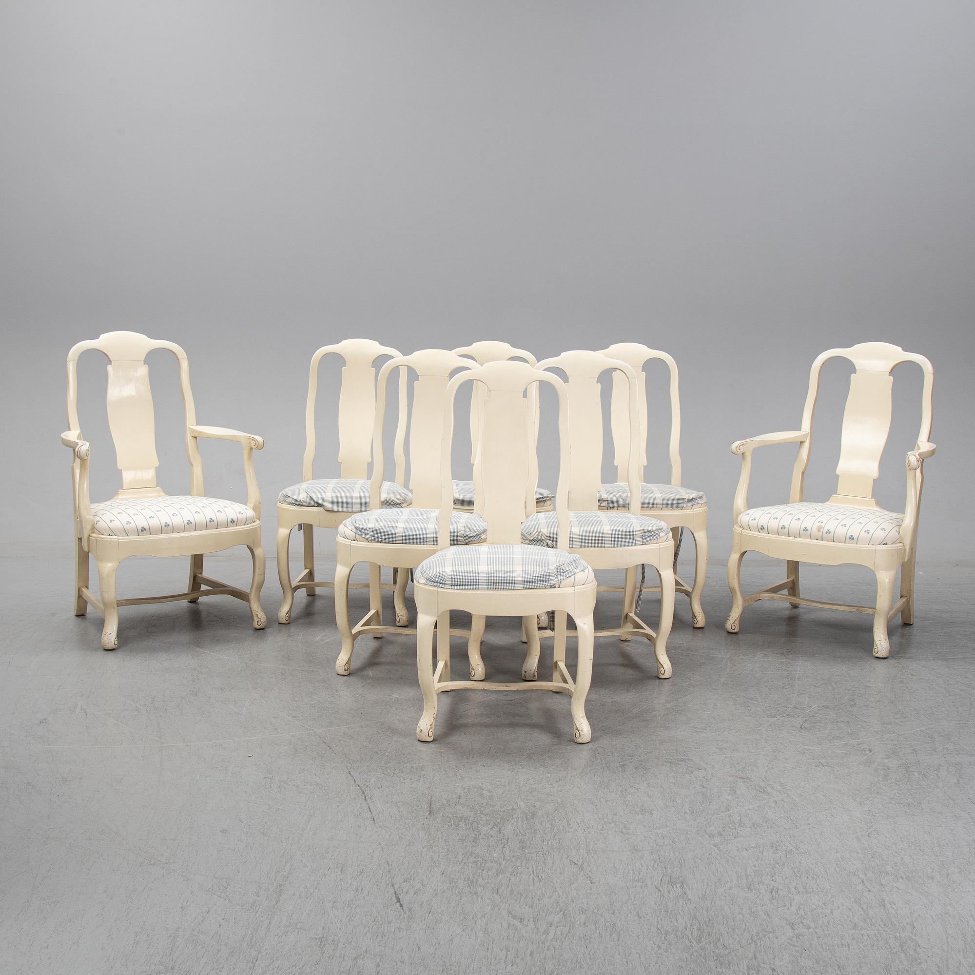 A set of six chairs and a pair of armchairs, rococo style, early 20th century.