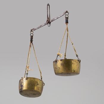 A 19th/20th century brass scale.