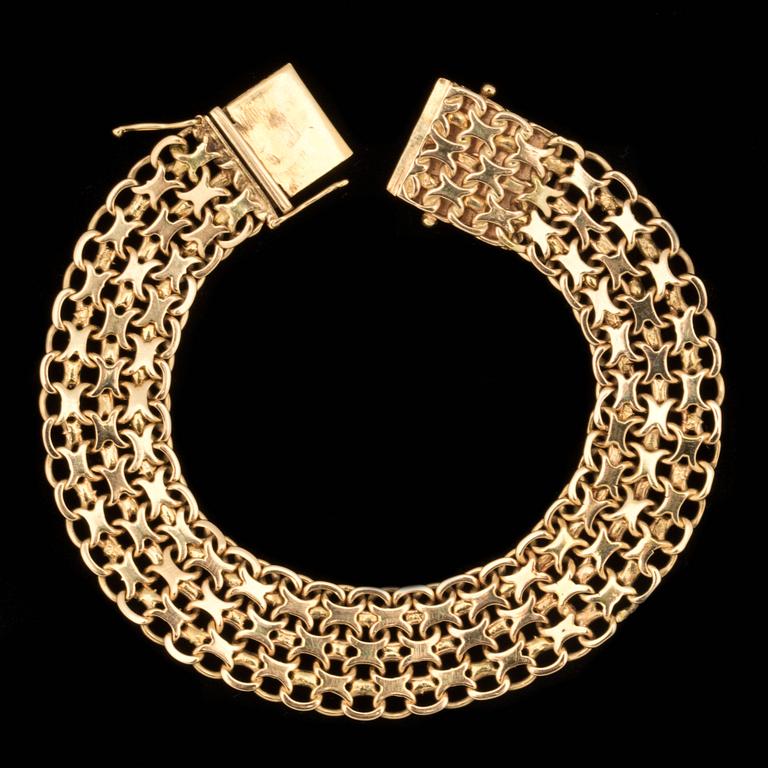 ARMLÄNK, 18 k guld, x-länk. Vikt ca 28 g. Guld- Och Silversmedjan H Svensso, 1961.