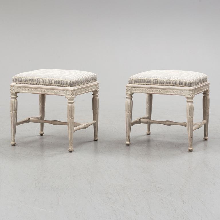 A pair of gustavian late 18th century stools by Erik Öhrmark (master in Stockholm 1777-1813).