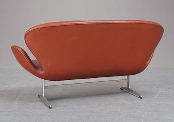 An Arne Jacobsen brown leather and aluminium "Swan" sofa, Fritz Hansen, Denmark.