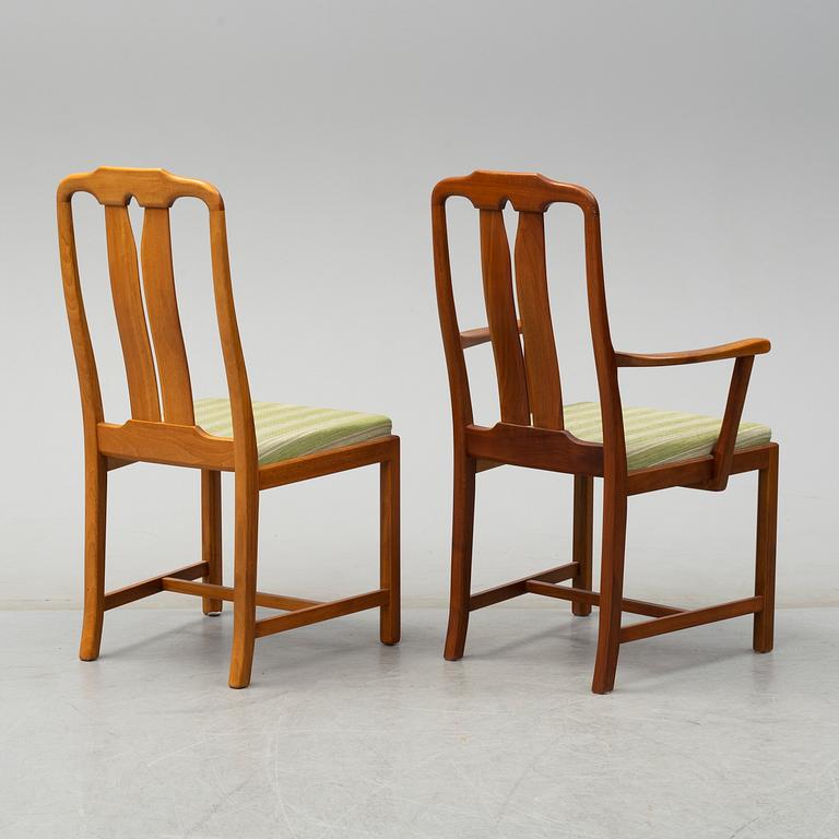 A second half of the 20th century table, two armchairs and six chairs "Ambassadör" by Carl Malmsten.