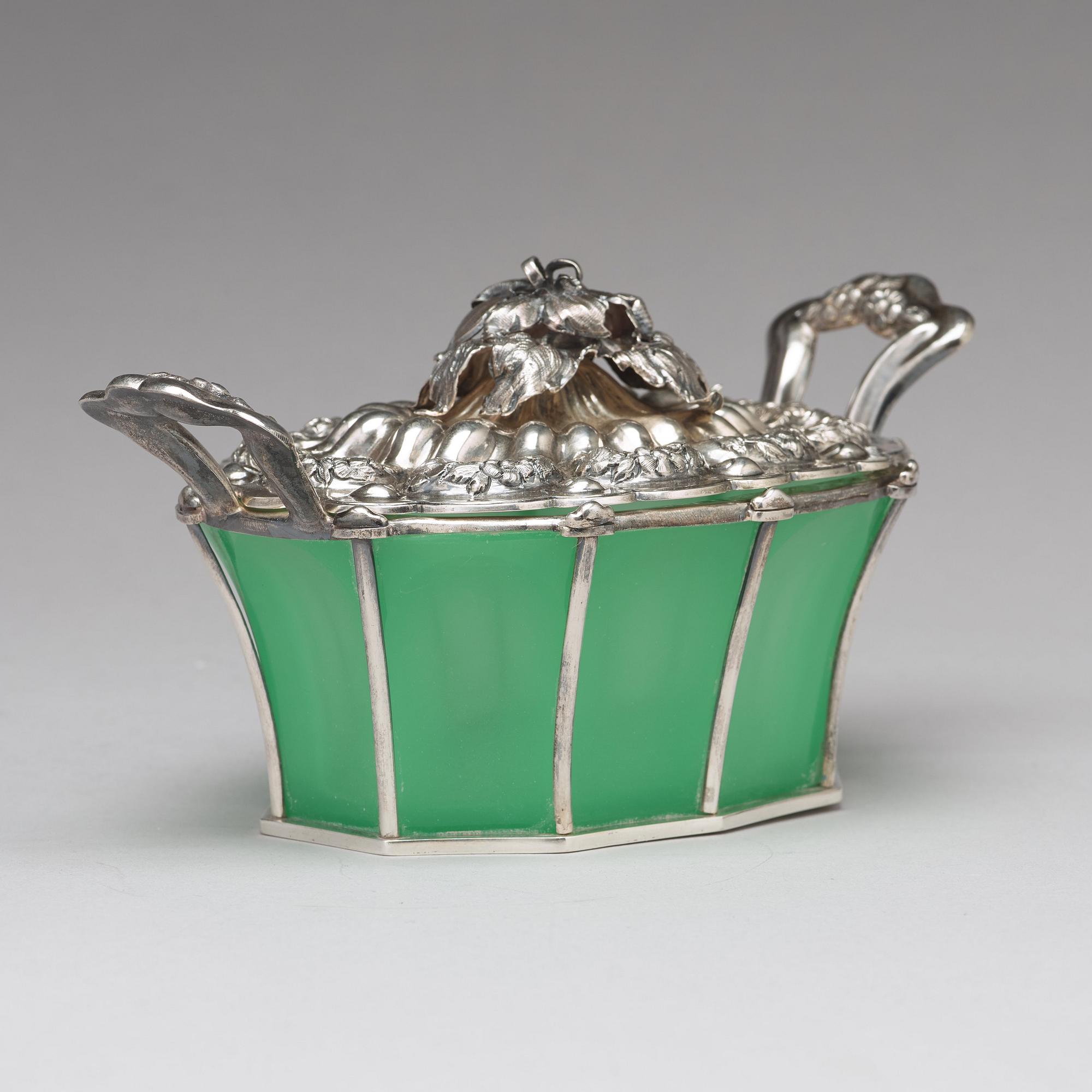 An Austrian mid 19th century silver and green glass bowl and cover on dish, un identified makers mark, Vienna 1845.