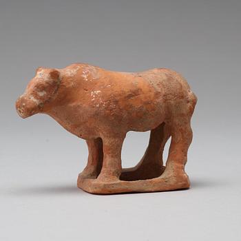 Three pottery scultpures of animals and a herdsman, Tang dynasty (618-906).