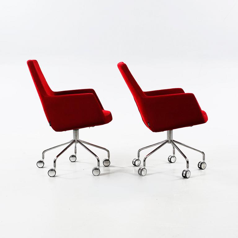 A pair of 21th century arm chairs by Roger Person, model "Happy", Swedese.