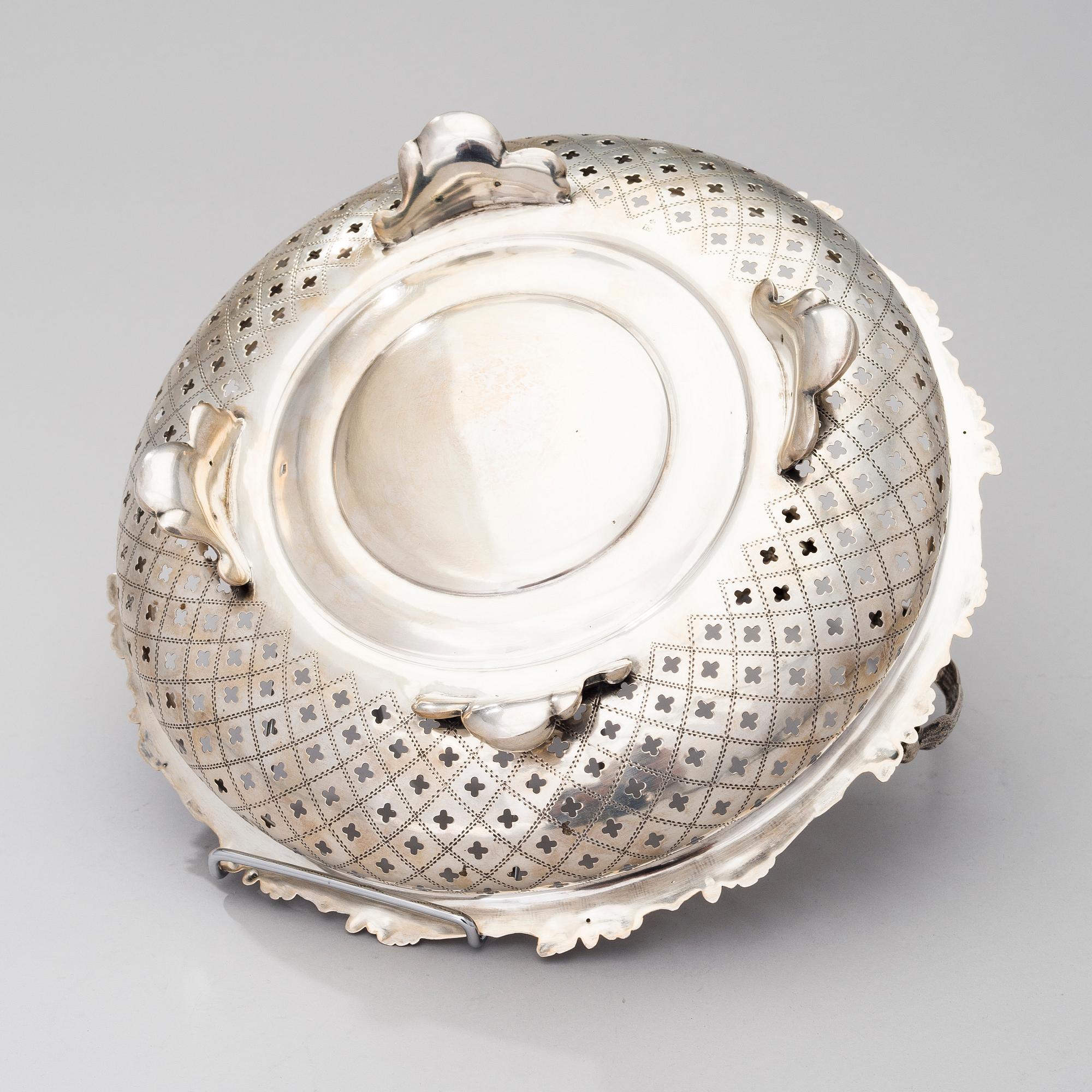 A SILVER SWING HANDLE BASKET, Germany late 19th century, controll marks Soviet Union, 20th century, weight 694 g.