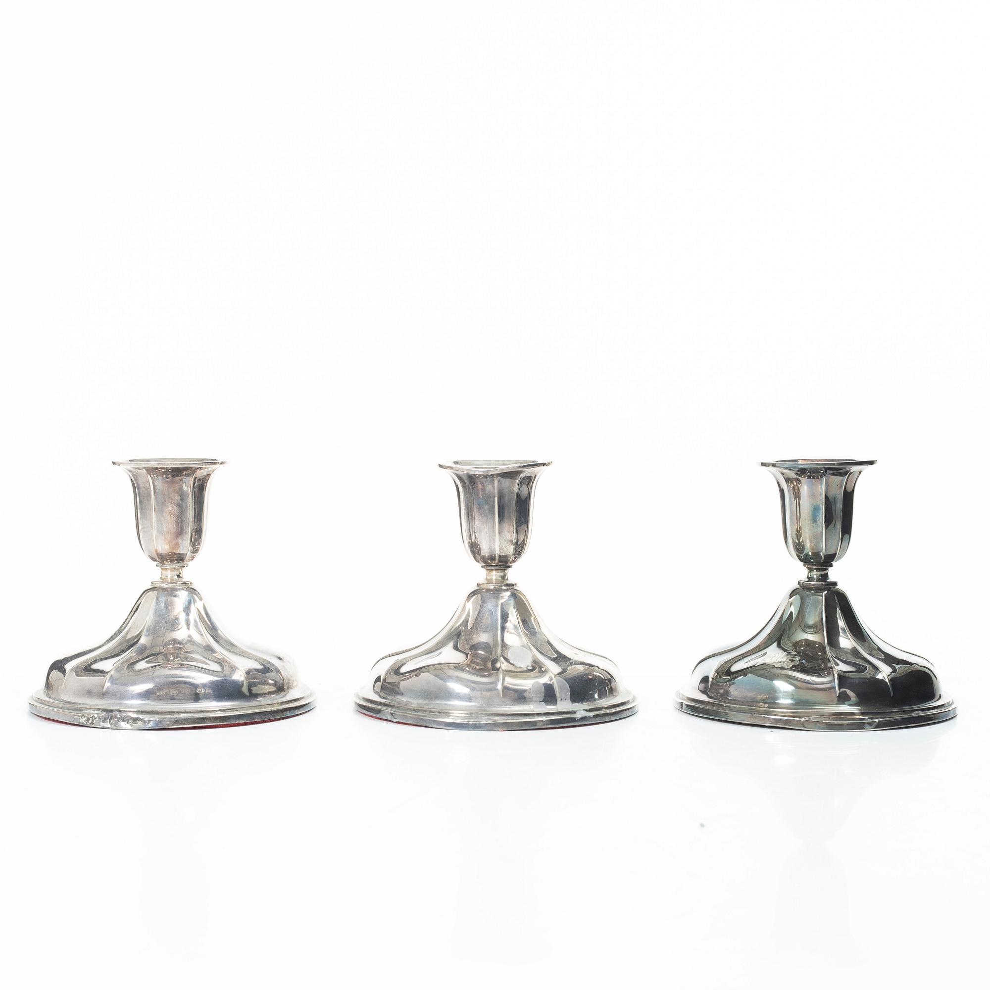 Three silver candlesticka, Norway, 20th century.