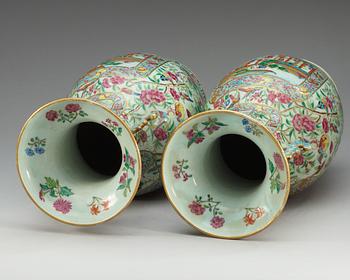 A pair of famille rose Canton vases, Qing dynasty, 19th Century.