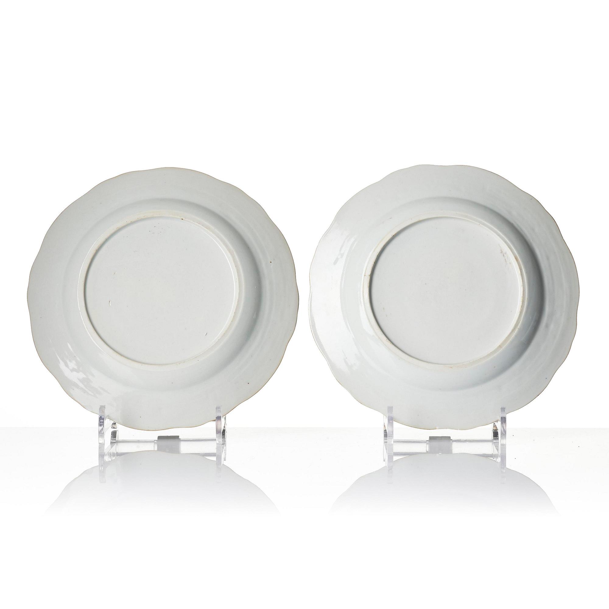 A pair of 'Chinese Export' armorial dinner plates, Qing dynasty, 1790's.