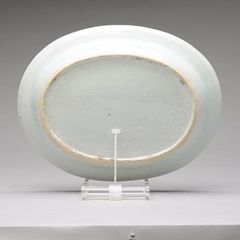 A famille rose 'double peacock' serving dish, Qing dynasty, Qianlong (1736-95).