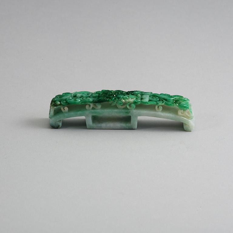 A Chinese carved jadeite belthook, 20th Century.