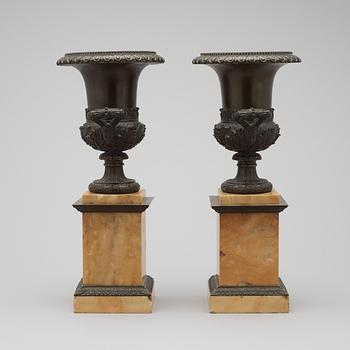 A pair of French mid 19th century patinated bronze and Siena marble tazza.