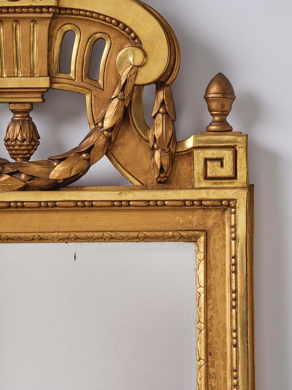 A Gustavian giltwood mirror, Stockholm, late 18th century.
