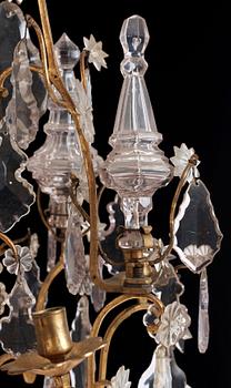 A Louis XV 18th/19th century century six-light chandelier.