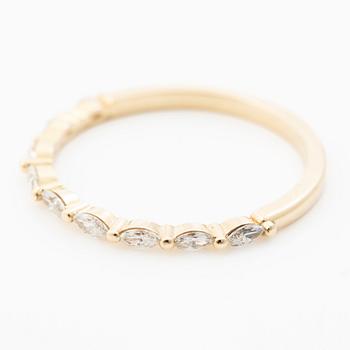 14K gold ring with marquise-cut diamonds.