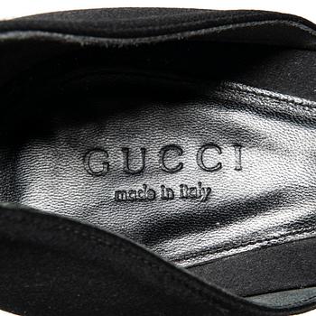 SKOR, Gucci.