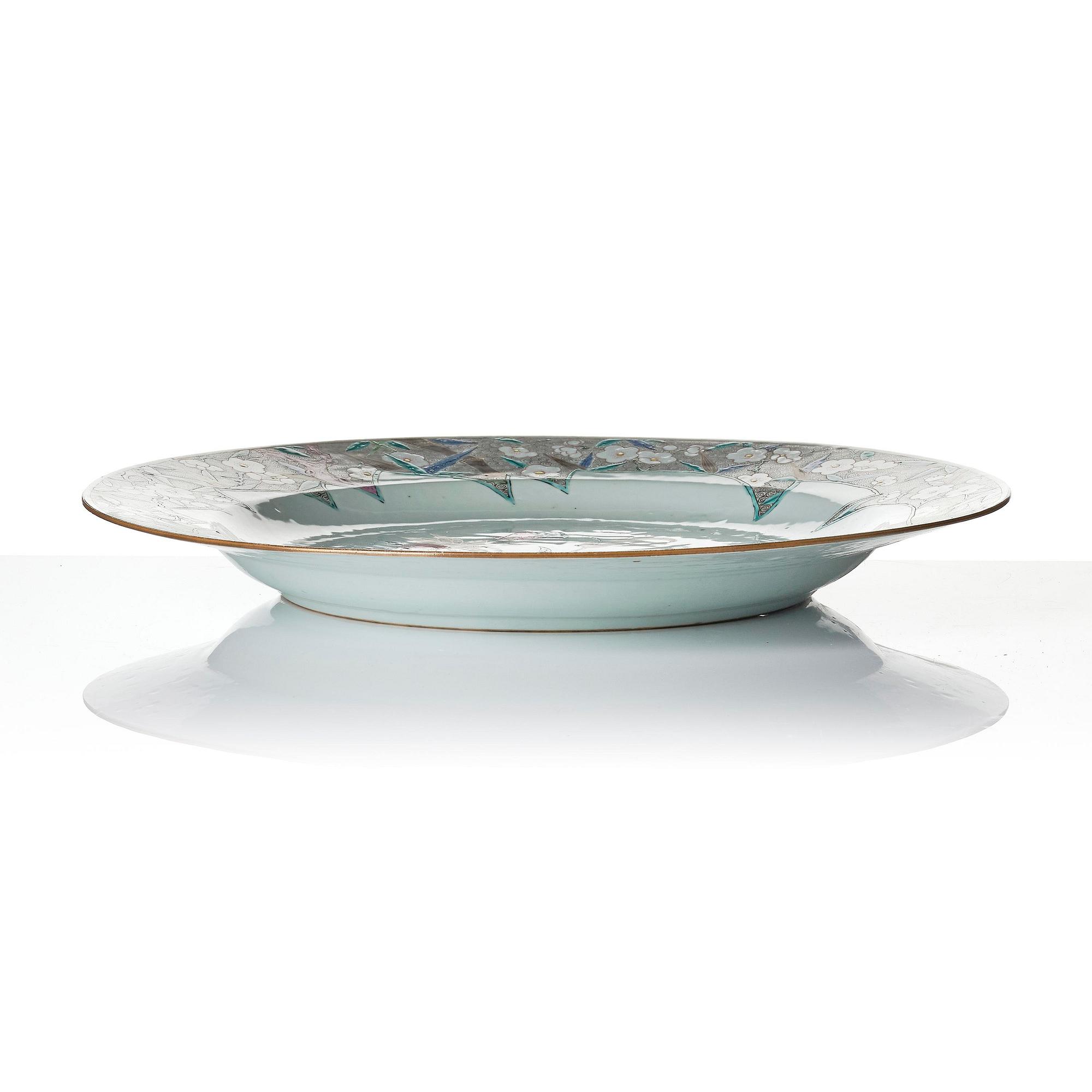 A famille rose serving dish and six dinner plates, Qing dynasty, Qianlong (1736-95).
