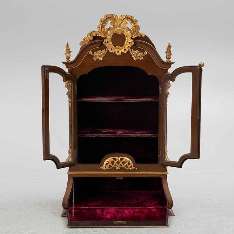 A Rococo style cabinet, late 19th century.