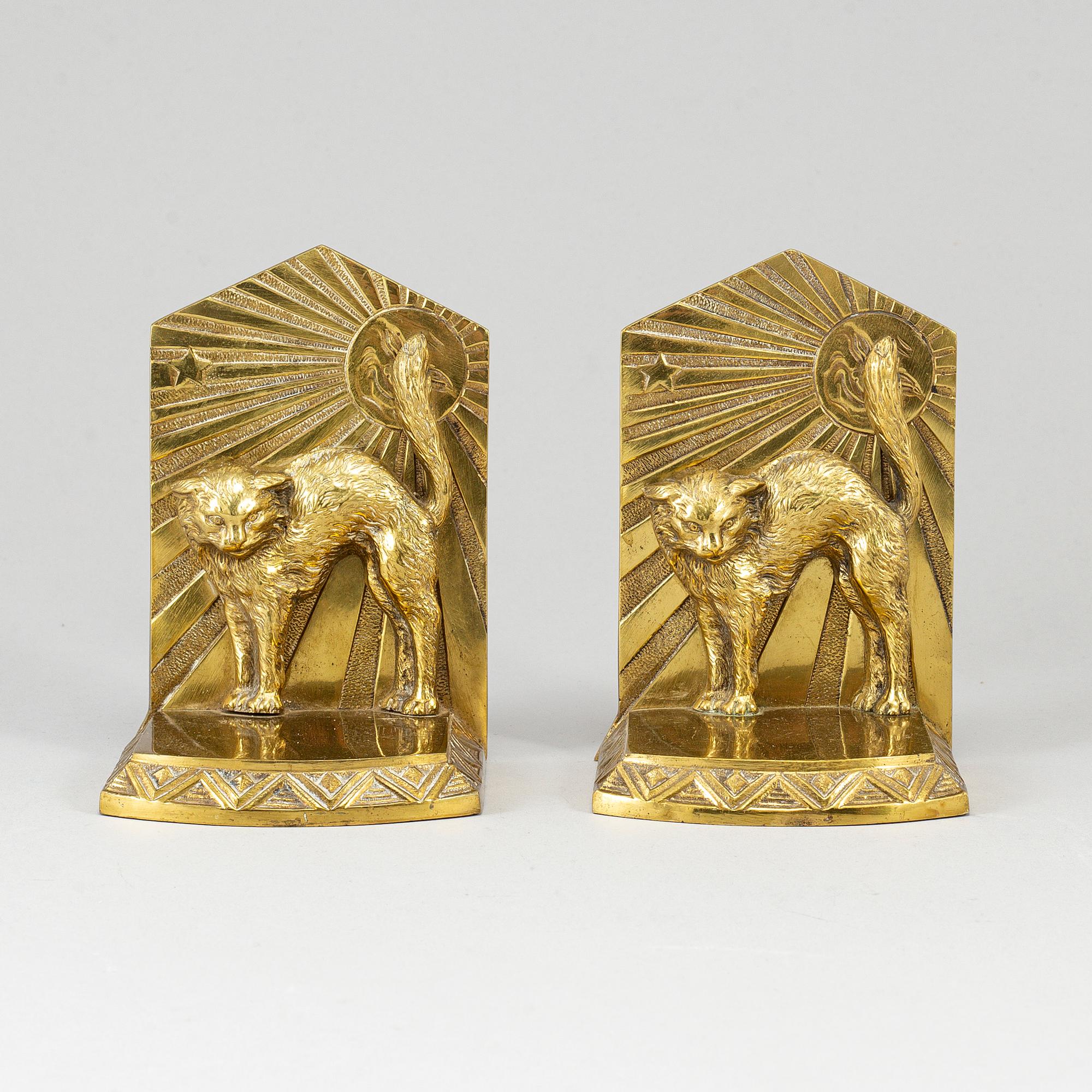 A pair of art déco bronze book ends, 1930s.