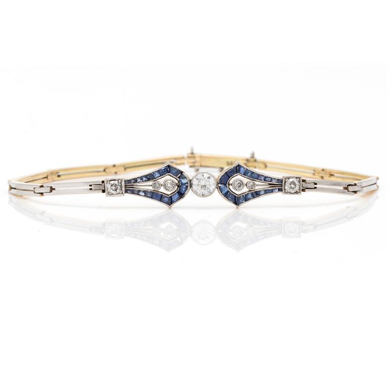 An Art Deco bracelet with old-cut diamonds and carré-cut sapphires.