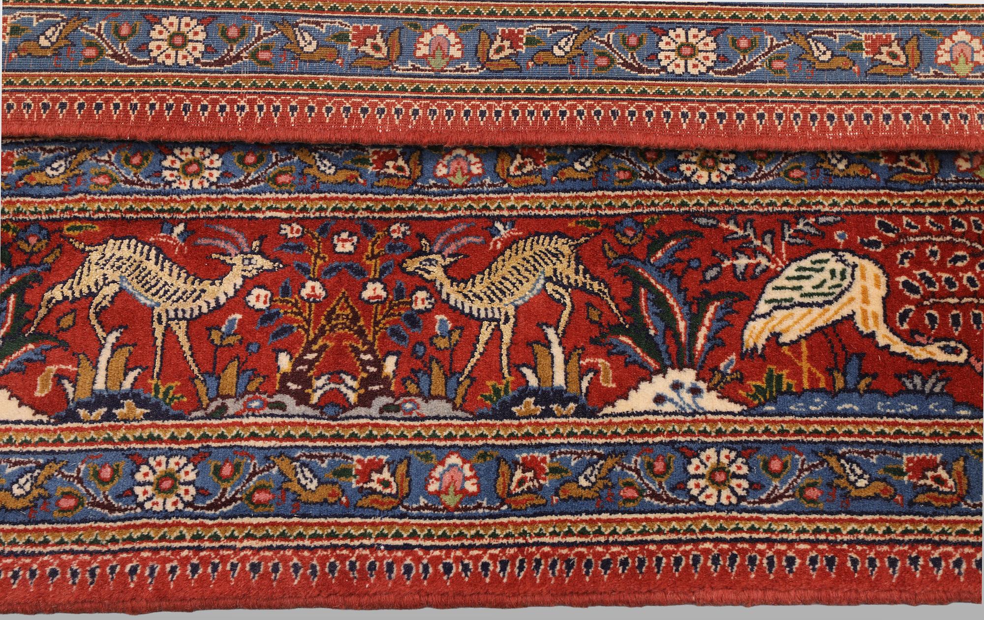 A Moud part silk carpet, 354 x 252 cm.