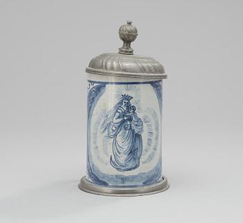 A faience and pewter jug. 18th century.