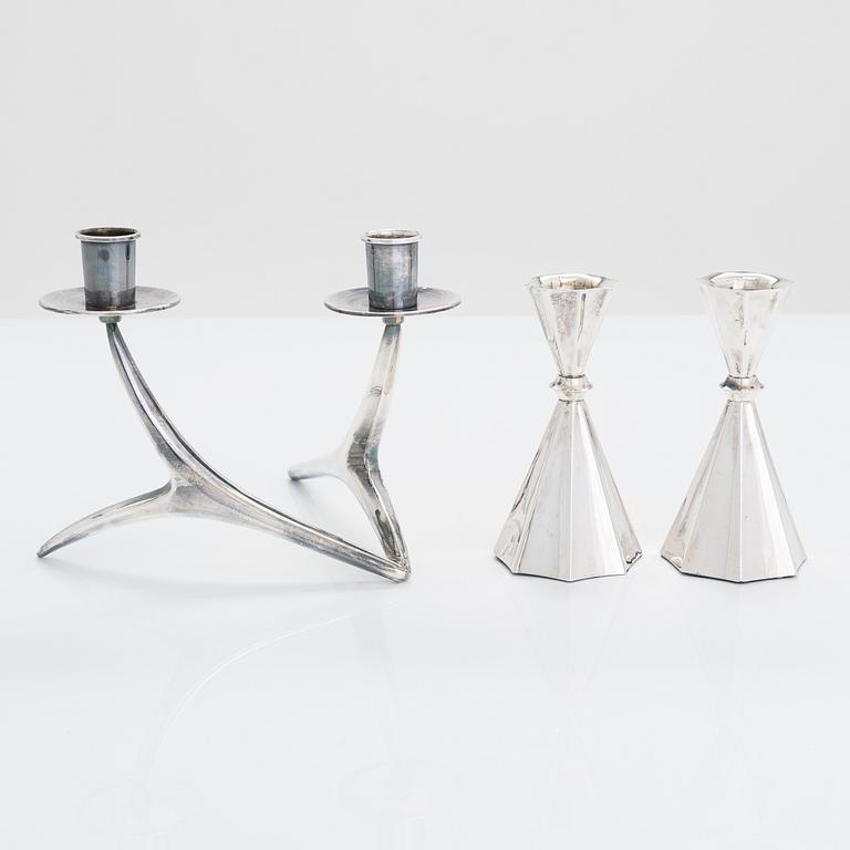 A 2-arm silver candle holder and a pair of silver candlesticks, Anna-Greta Eker and Hopearae Lasander, Turku 1965, 1963.