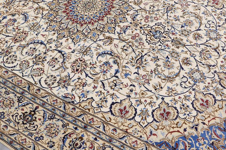 A carpet, Nain part silk, 364 x 256 cm.