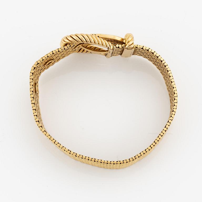 An 18K gold braclet by Georges L'Enfant for Hermès.