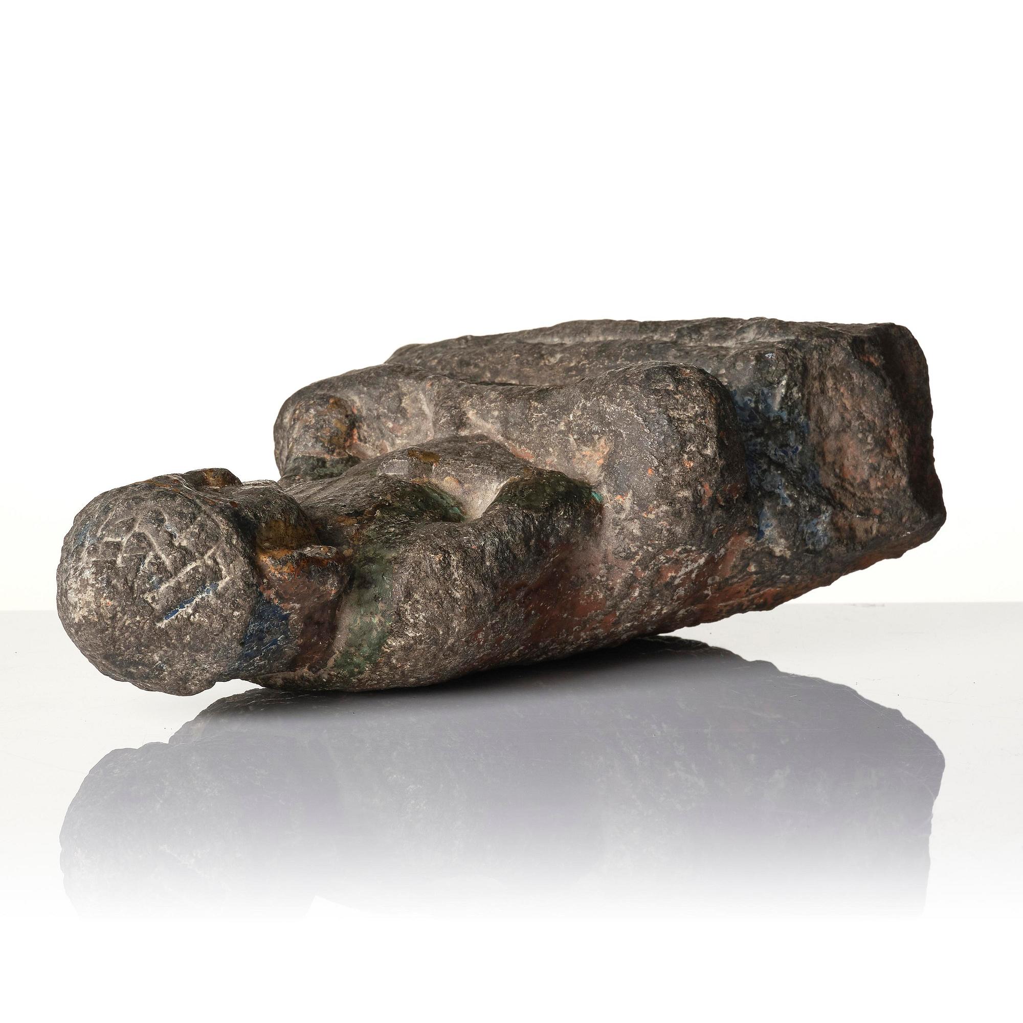 A stone sculpture of Buddha, Ming style.